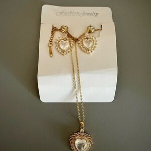 Women’s silver and gold heart shaped jewelry set